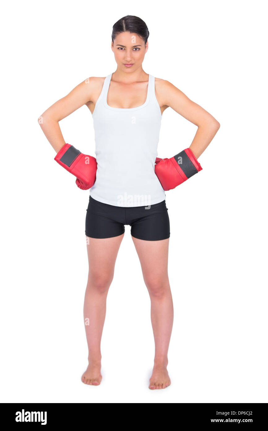 Competitive young model with boxing gloves posing Stock Photo
