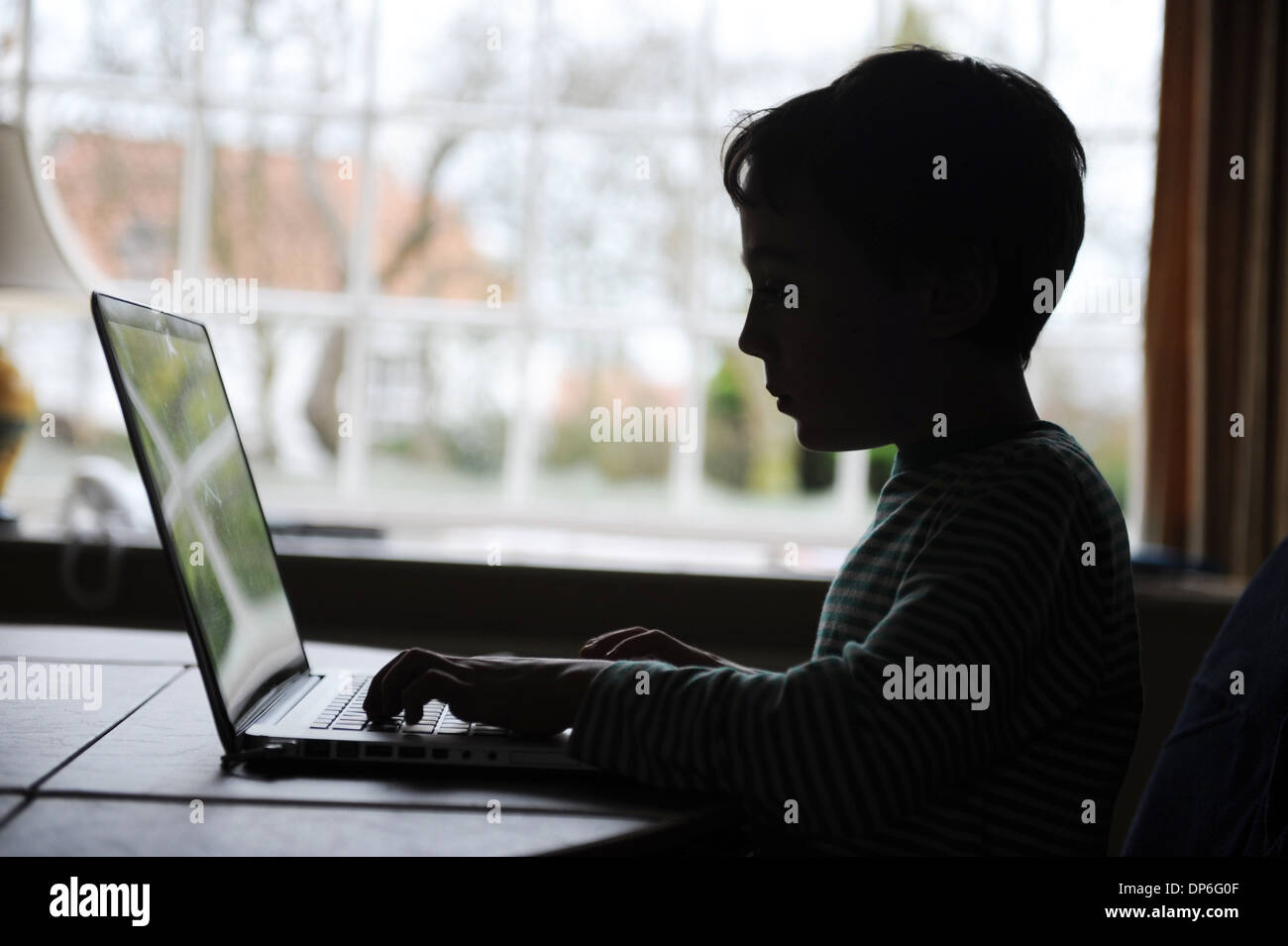 Bedroom child laptop homework hi-res stock photography and images - Alamy
