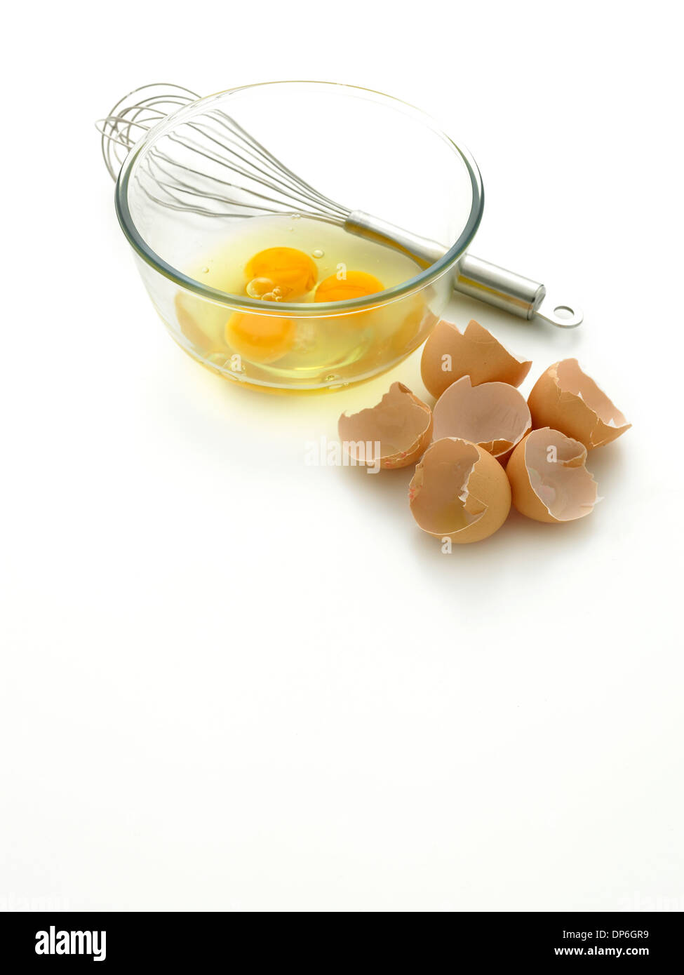 eggs bowl and whisk Stock Photo