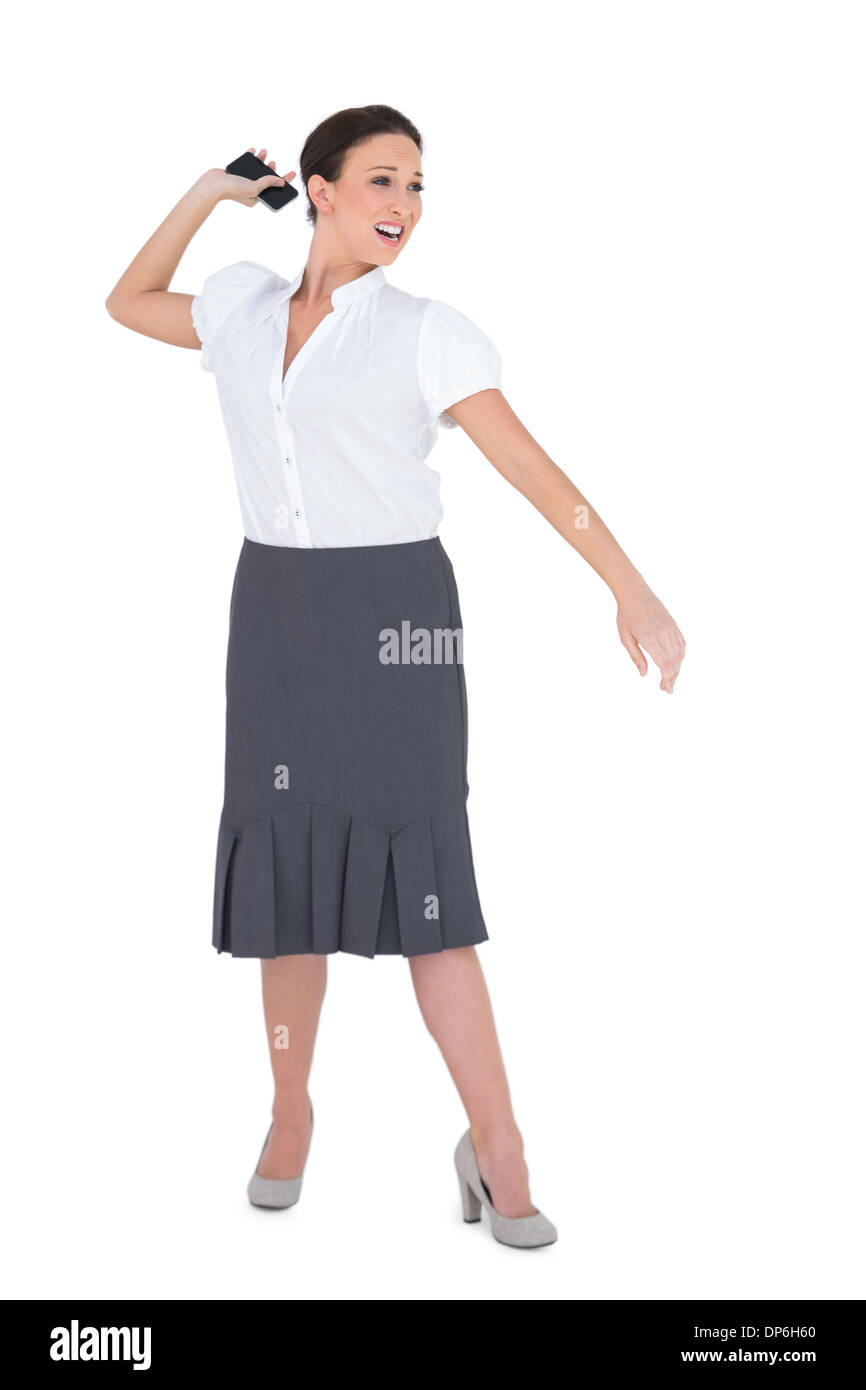 Angry businesswoman throwing her phone away Stock Photo Alamy