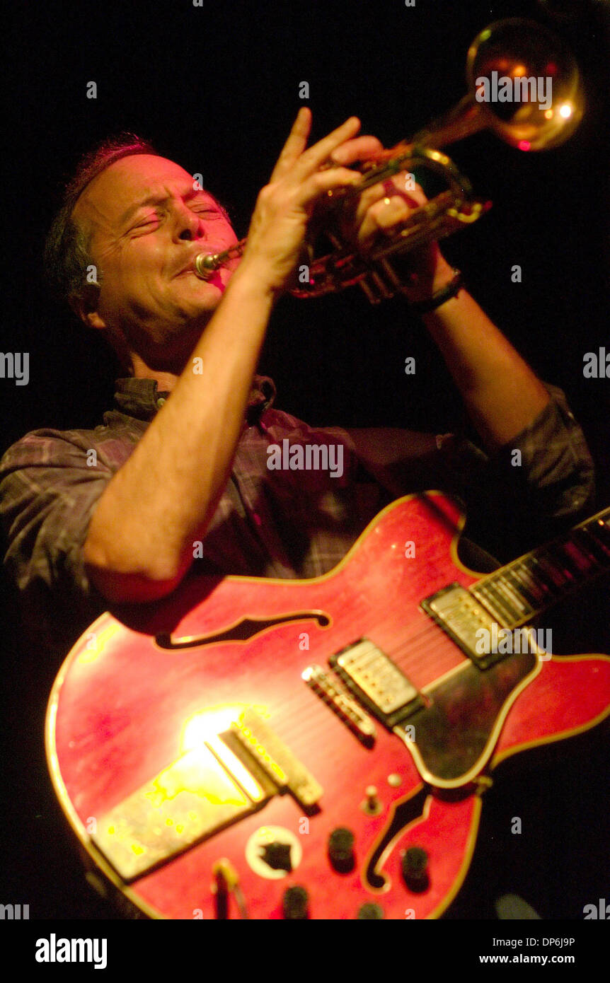 Oct 15, 2006; Berkeley, CA, USA; Leader of the band Wayward Monks, Dan Zalles, plays both guitar and trumpet during a performance at the Starry Plough in Berkeley, Calif. on Saturday, October 14, 2006.  The pub is an institution of drinking and live music.  Mandatory Credit: Photo by Tue Nam Ton/Contra Costa Times/ZUMA Press. (©) Copyright 2006 by Contra Costa Times Stock Photo