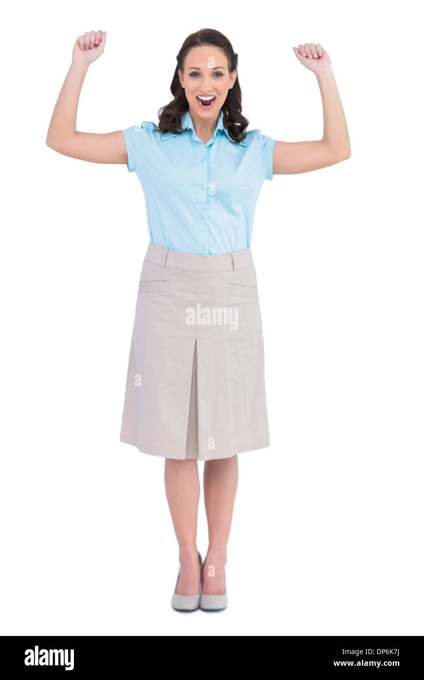 Victorious stylish businesswoman posing Stock Photo