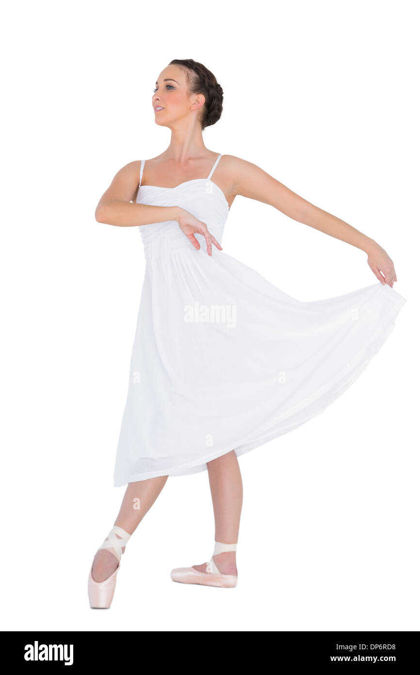Focused young ballet dancer posing Stock Photo
