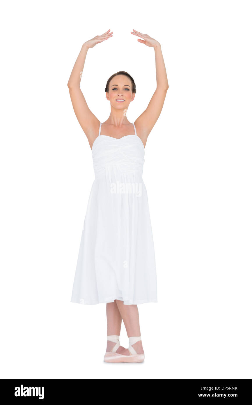 Peaceful young ballet dancer standing in a pose Stock Photo - Alamy