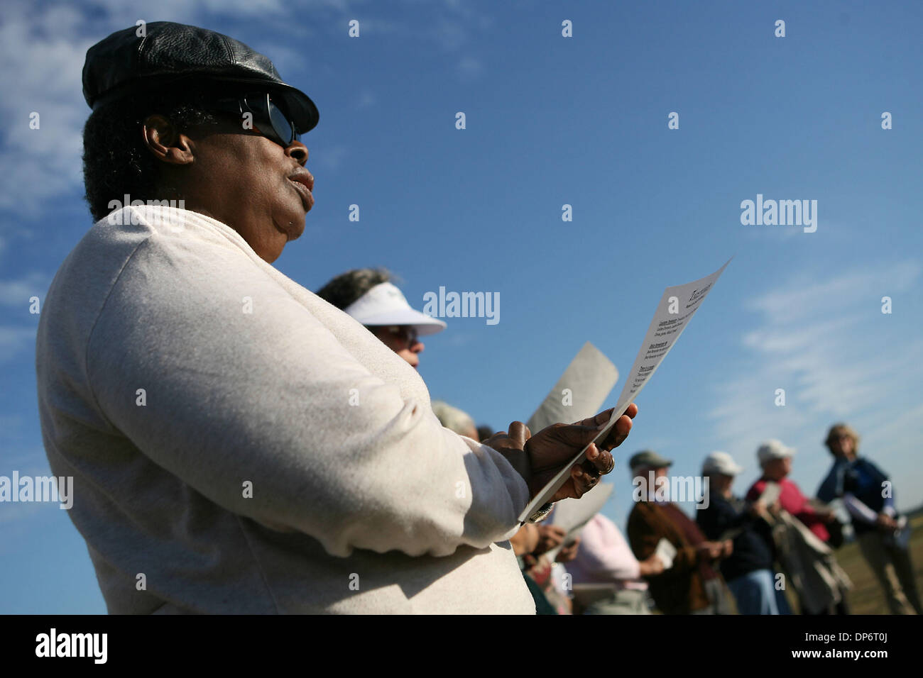 Oct 25, 2006; Starke, FL, USA; Alexia Hope, of Palm Bay, prays with other demonstrators gather outside of the Florida State Prison in Starke, where convicted serial killer Danny Rolling was executed by lethal injection on October 25, 2006.  Rolling was responsible for the slaying of five college students in 1990. Mandatory Credit: Photo by J. Gwendolynne Berry/Palm Beach Post/ZUMA  Stock Photo