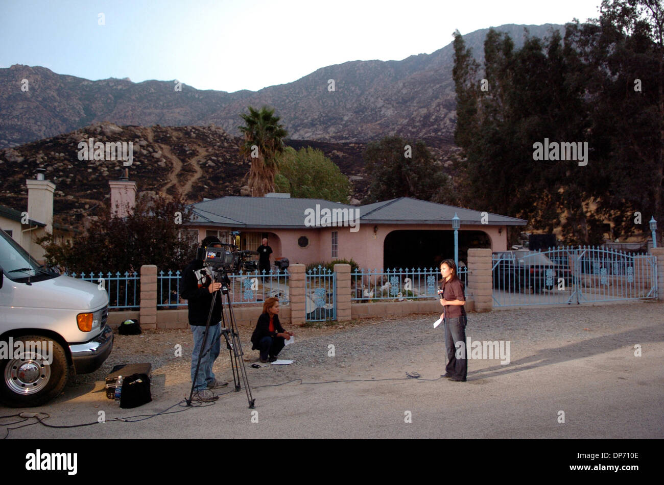 Oct 30, 2006; Cabazon, CA, USA; A news crew stands in front of a home