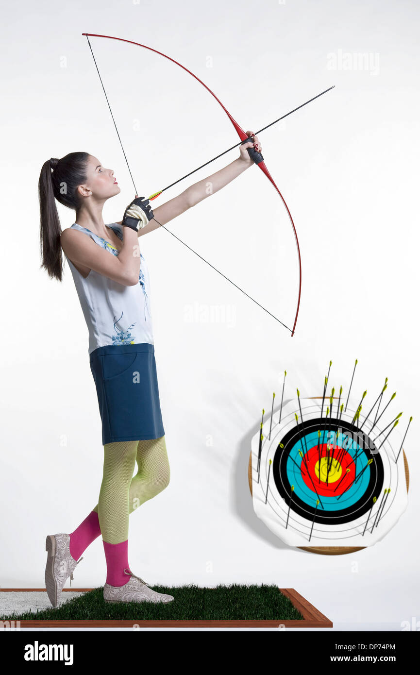 Young women archery hires stock photography and images Alamy