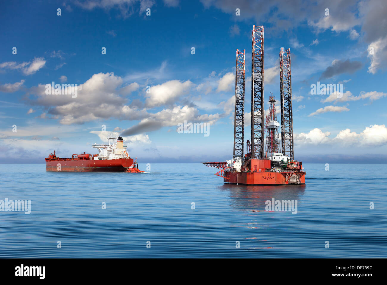 Oil rig and tanker ship on offshore area. Stock Photo