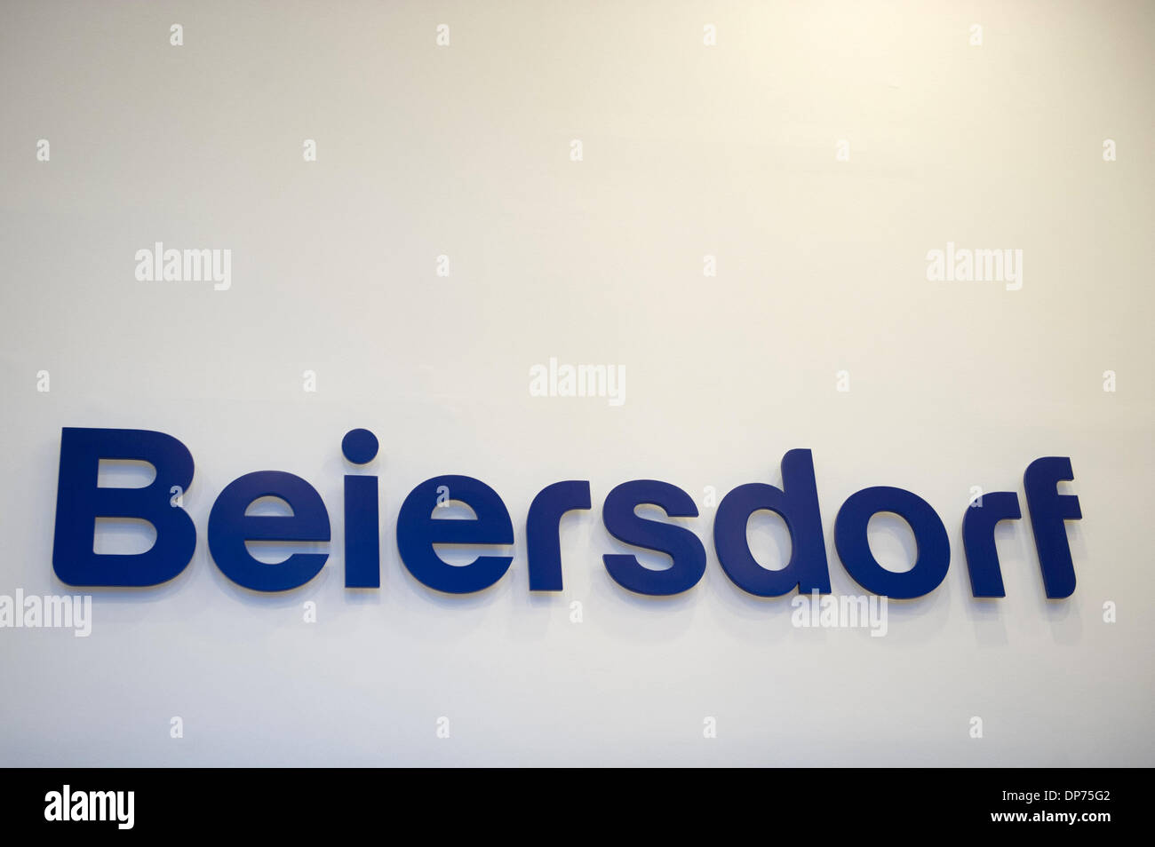 Hamburg, Germany. 08th Jan, 2014. The new logo of the German personal care company Beiersdorf is pictured at the Beiersdorf AG research center in Hamburg, Germany, 08 January 2014. The manufacturer of products like the popular Nivea moisturiser renews it's logo for the first time in 35 year's. Photo: MAJA HITIJ/dpa/Alamy Live News Stock Photo