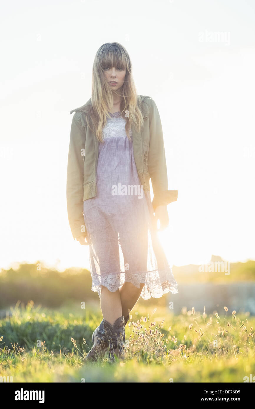 Fashionable young girl in sheer dress and jacket Stock Photo