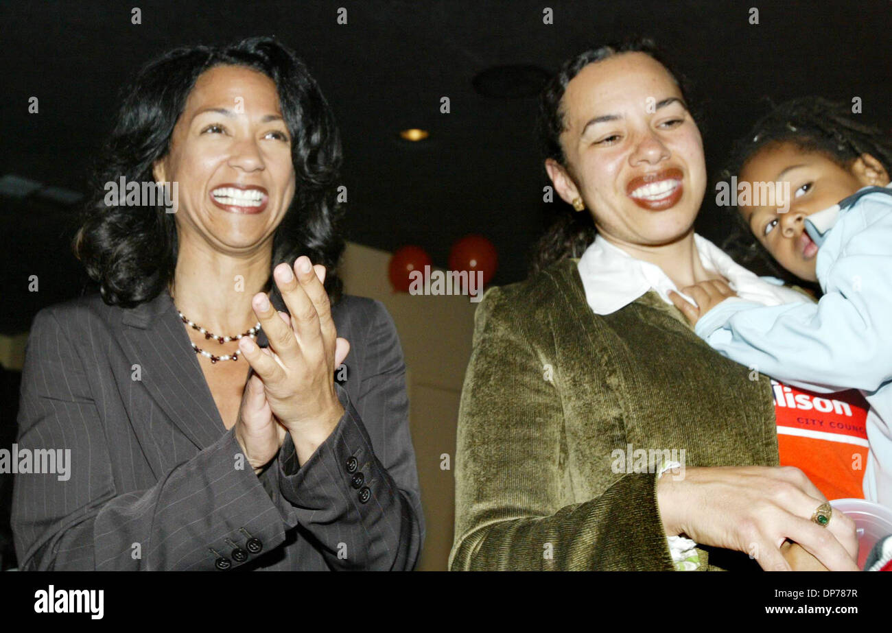 Nov 07, 2006; Oakland, CA, USA; Oakland City Council candidate Aimee Allison, left, with supporter Rhonda Ngom and her daughter Nadia Nghom, 4 1/2, listen to one of the guest speakers at  Maxwell's restaurant in Oakland. Allison hopes to be elected for district 2 and replace current councilwoman Patricia Kernighan. Mandatory Credit: Photo by Ray Chavez/Oakland Tribune/ZUMA Press. ( Stock Photo