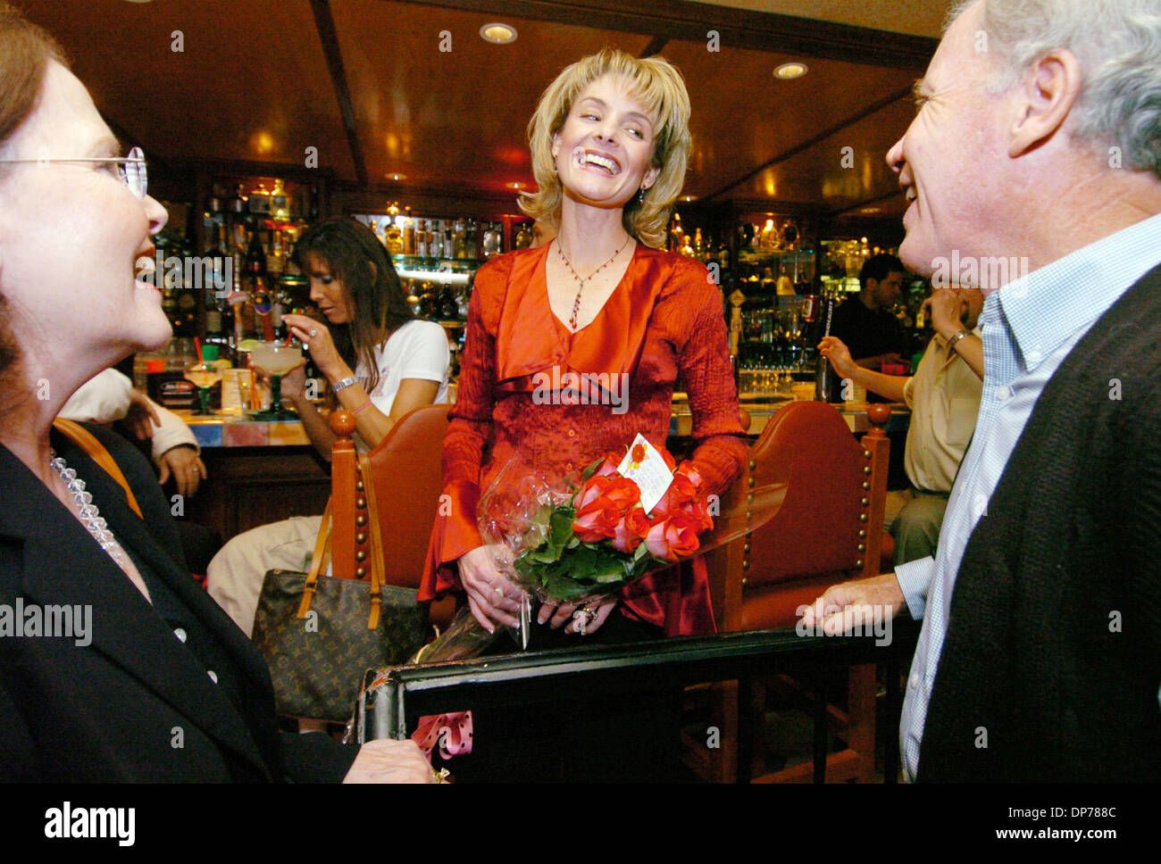 Nov 07, 2006; Pleasanton, CA, USA; Jill Buck ( center), Republican candidate for the 18th Assembly District, holds an election night party at Alberto's Cantina in Pleasanton Tuesday, November 7, 2006. Here, speaks with guests Gail and John Gilpin ( Pleasanton). Mandatory Credit: Photo by Gina Halferty/Tri-Valley Herald/ZUMA Press. (©) Copyright 2006 by Tri-Valley Herald Stock Photo