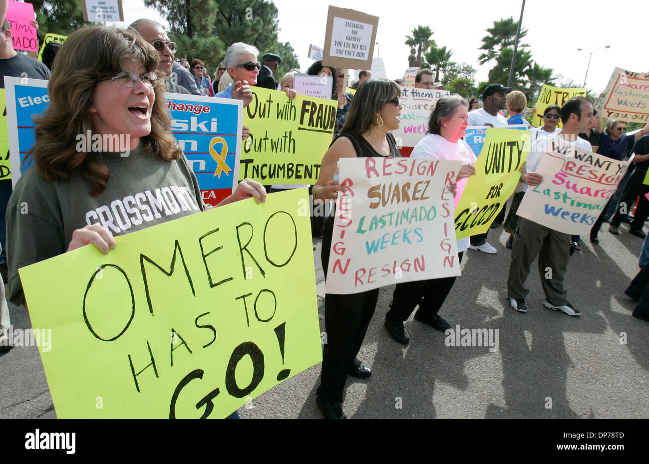 Jul 03, 2006; San Diego, CA, USA; At left, KAREN CLIFFE held her sign during a faculty rally at Grossmont College demanding resignation of Grossmont-Cuyamaca Chancellor Omero Suarez for altering his contract without board approval; resignation of other officials involved also; including board president Deanna Weeks and vice chancellor human resources Ben Lastimado.  Mandatory Credi Stock Photo