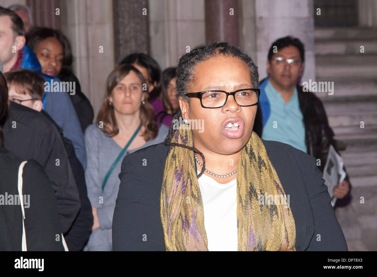 Royal Courts of Justice, London, January 8th 2014. A spokesperson for Mark Duggan's family addresses the press following the lawful killing verdict in the inquest into his death. Credit:  Paul Davey/Alamy Live News Stock Photo
