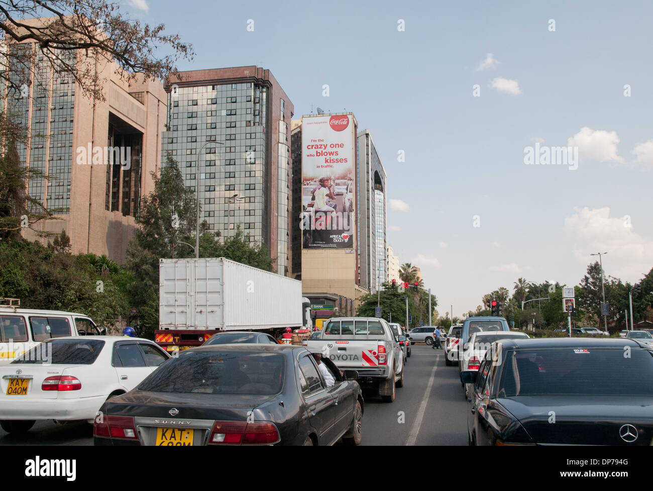 Dense traffic on Uhuru Highway Nairobi Kenya Africa with traffic lights ahead Stock Photo