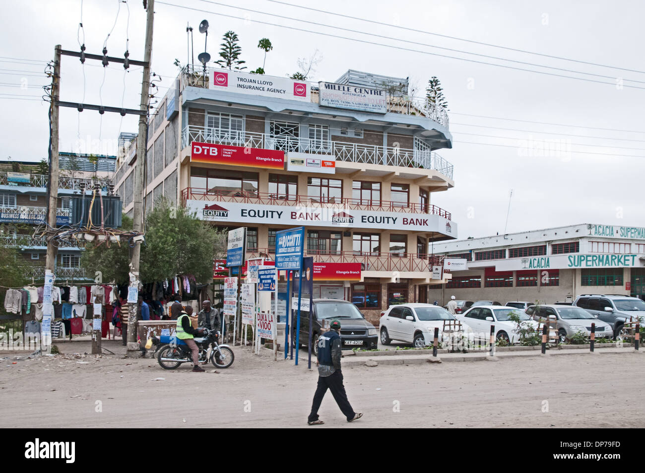 Multi storey office building housing Equity Bank and other businesses adjacent to Acacia Supermarket in Kajiado Kenya Stock Photo