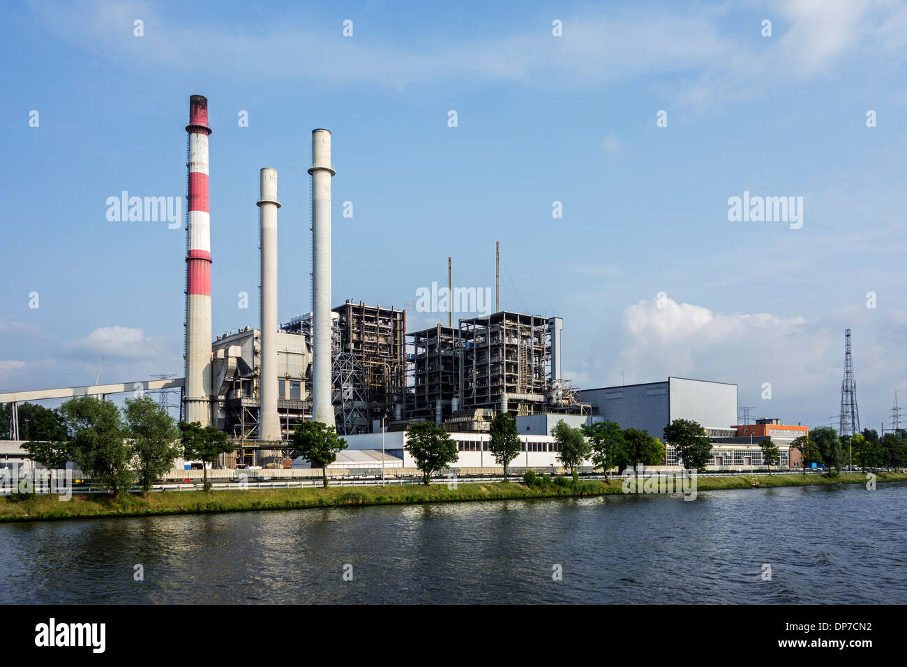 Power station of the Electrabel energy corporation along the Ghent-Terneuzen Canal at Ghent seaport, Belgium Stock Photo