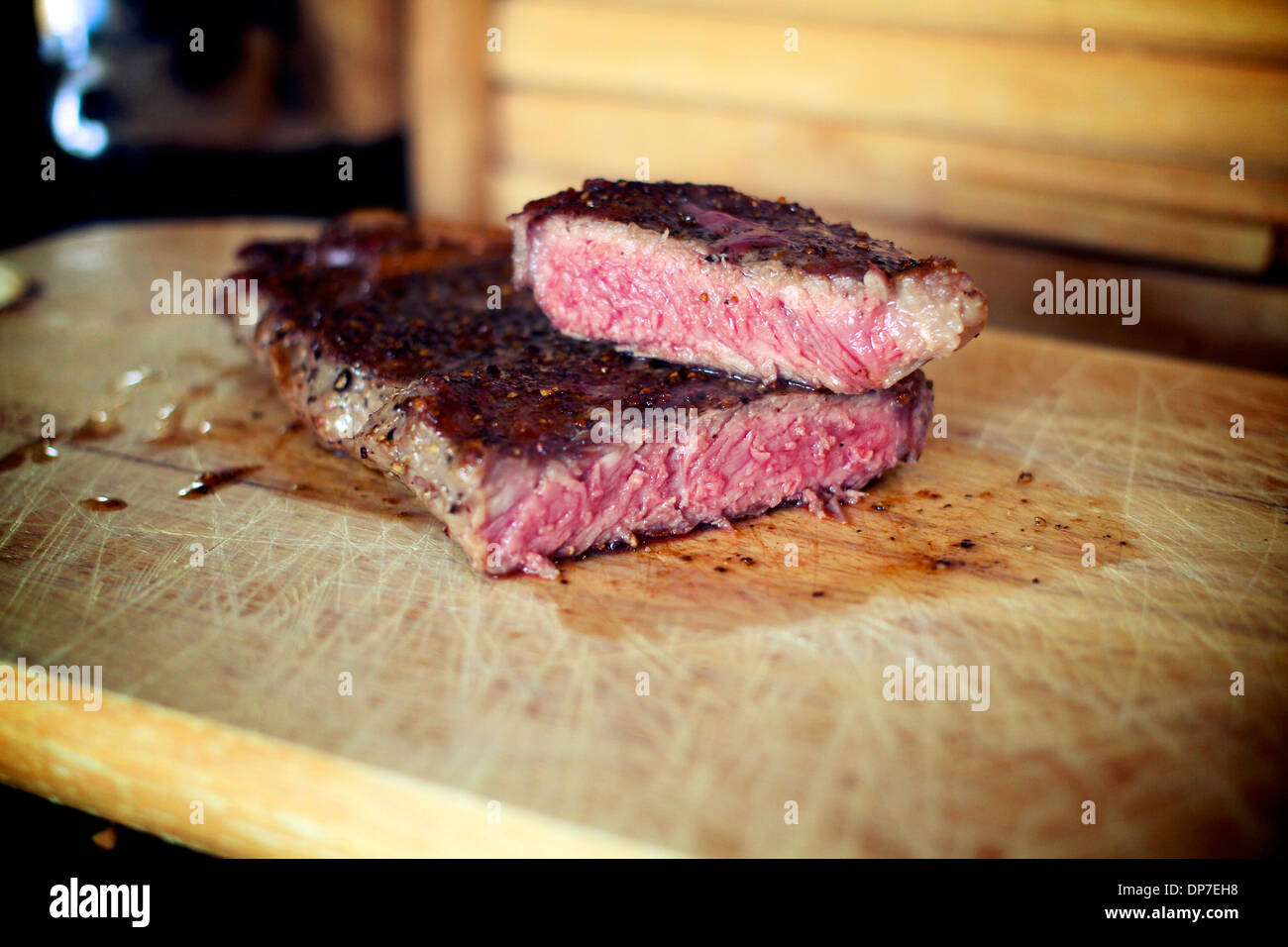 Rare cooked beef sirloin steak grill Stock Photo