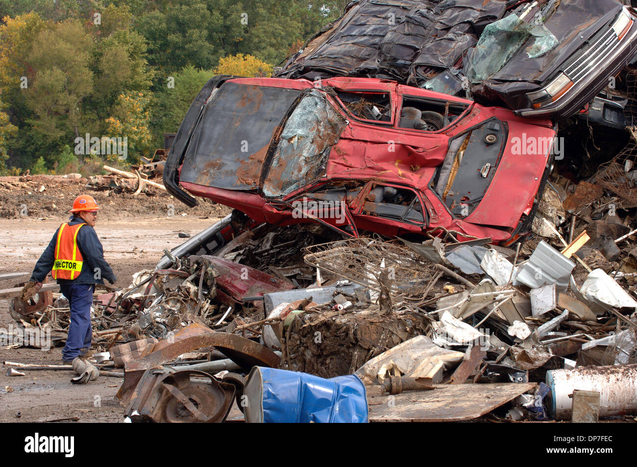 Nov 15, 2006; Atlanta, GA, USA; Crushed and stripped autos are readied for scrapping at scrap metal operation. Some larger peices of metal are cut down with cutting torches and then flattened by huge machines, then metal is recycled by being melted down for re-use. Mandatory Credit: Photo by Robin Nelson/ZUMA Press. (©) Copyright 2006 by Robin Nelson Stock Photo
