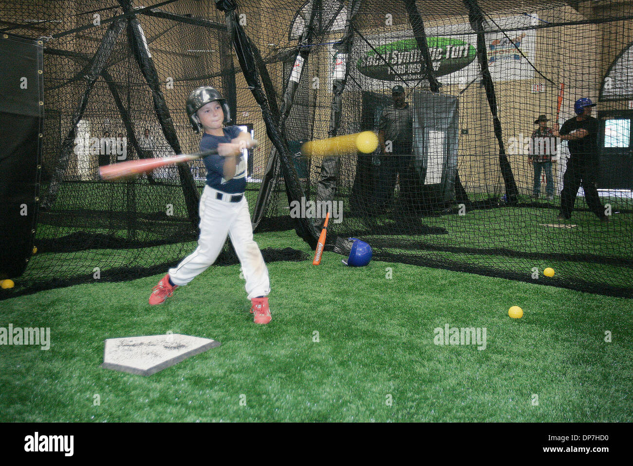 Oct 25, 2006; San Diego, CA, USA; LUCAS SAVOY, age 9, takes a swing at a  ball in one of eight batting cages available at the Del Mar Sports Center  at the