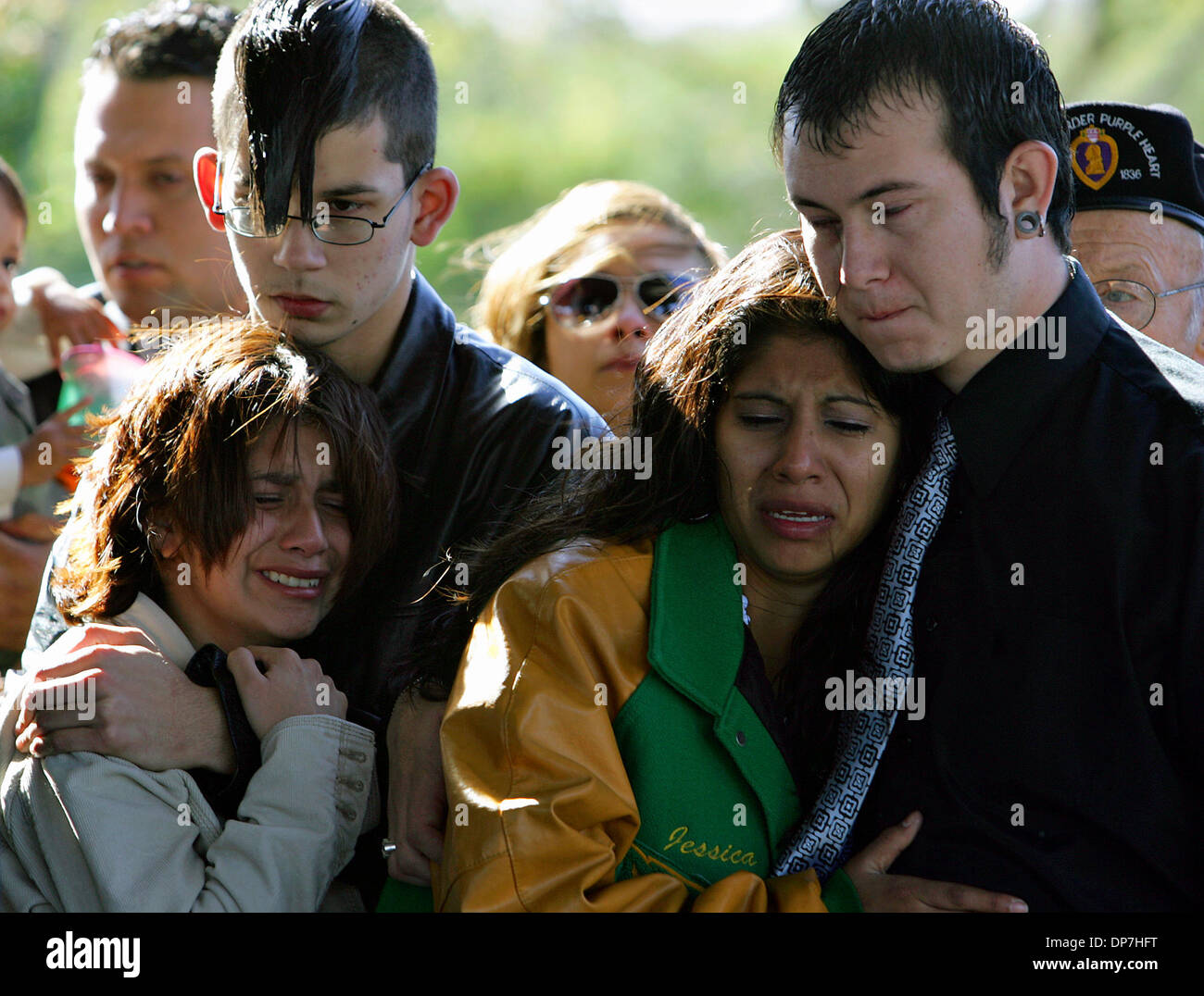 Nov 15, 2006; San Antonio, TX, USA; Lauren Morales, Steven Ruiz, Jessica Alkaabi and Augustine Gonzalez - all former Holmes High School classmates of Jose Galvan - attent the graveside service for Marine Cpl. Jose Galvan Tuesday, November 15, 2006 at Fort Sam Houston National Cemetary. Galvan was killed in the Anbar Province in Iraq. Mandatory Credit: Photo by Bahram Mark Sobhani/S Stock Photo