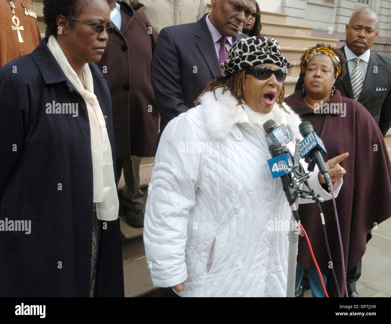 Nov 18, 2006; MANHATTAN, NEW YORK, USA; Jean Corbett Parker (L), of Harlem whose son Latran Parker was 26 when he was shot and killed in 2001 at the corner of 131st Street and 7th Avenue looks on as Jackie Rowe-Adams, (C) of Harlem discusses the separate shooting deaths of her sons Anthony Bouldin, 17 at the time and killed at 122nd and 7th Avenue and Tyrone Bouldin, 28 at the time Stock Photo