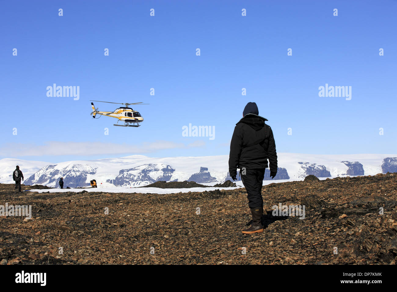Tourists waiting for arrival of helicopter, Devil Island, Weddell Sea, Antarctica, December Stock Photo
