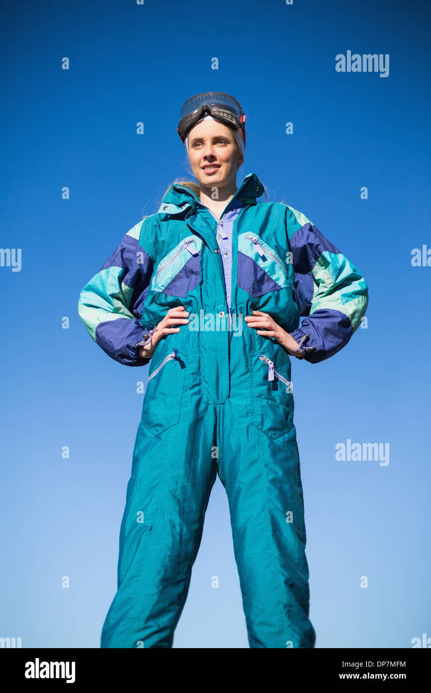 Woman wearing ski suit Stock Photo