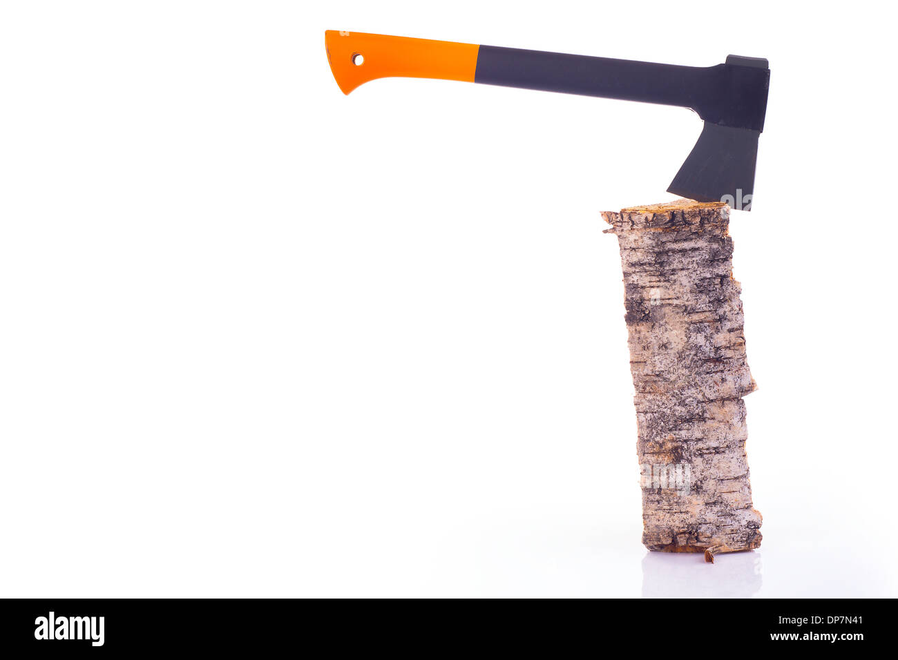 Axe stuck in a log Stock Photo