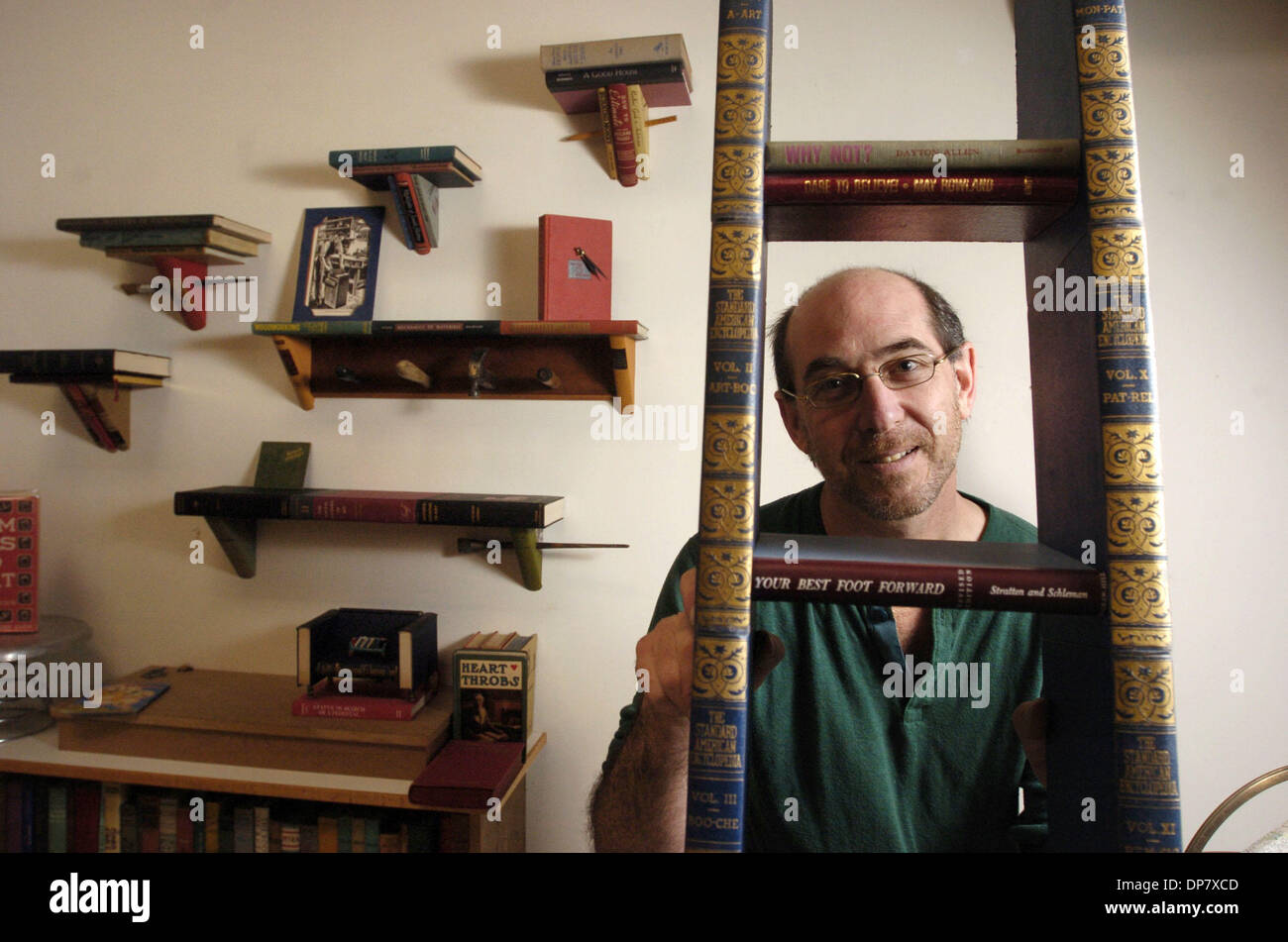 Jim Rosenow Nov 20, 2006; Berkeley, CA, USA; Jim Rosenau poses with a ladder he ...