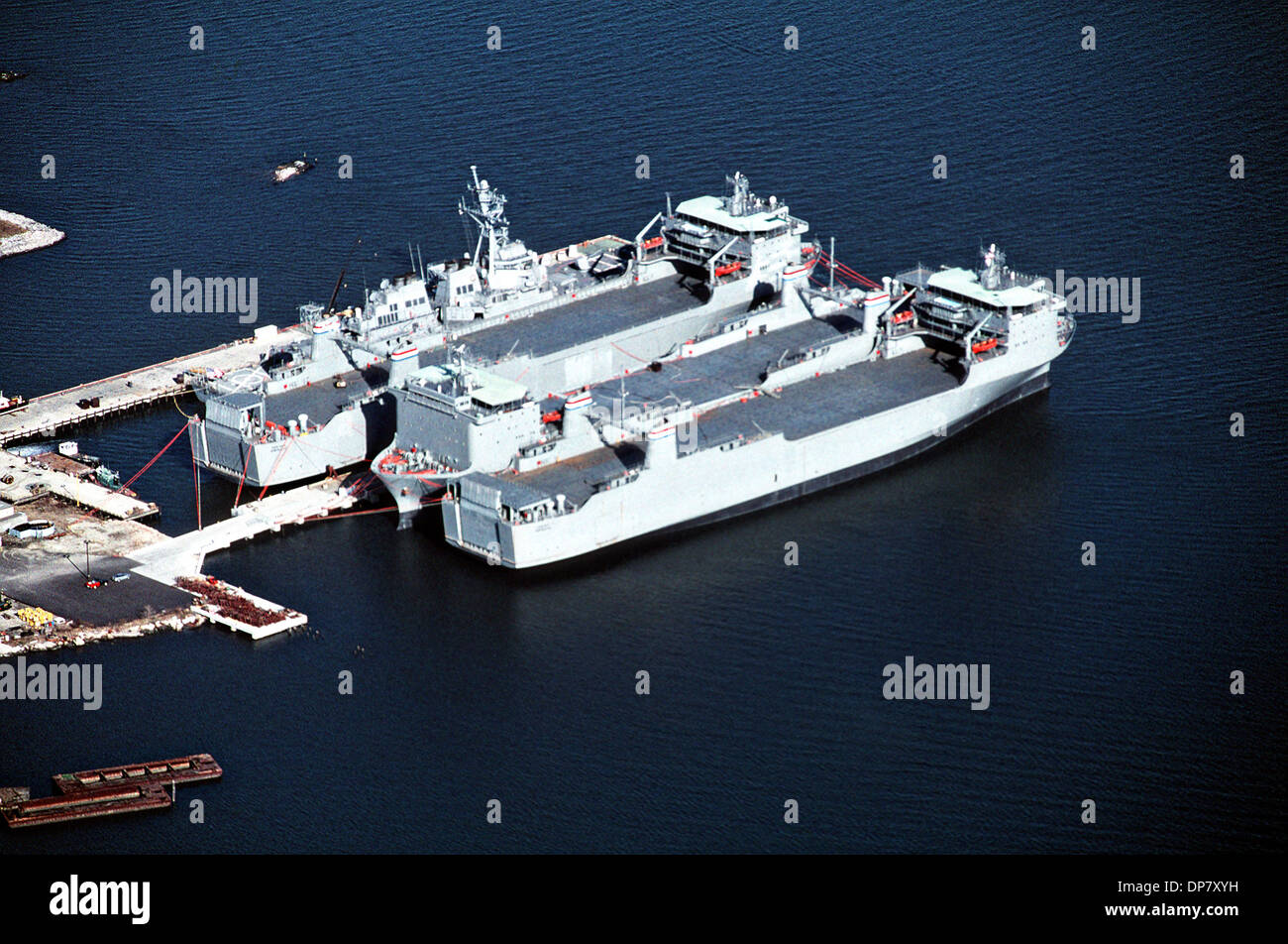 An aerial view of the guided-missile destroyer USS Arleigh Burke, the Military Sealift Command-chartered cargo ships Cape Race, Cape Ray and Cape Rise at dock January 22, 1995 in Portsmouth, Virginia. The Cape Ray which has been fitted with equipment to destroy Syrian Chemical weapons at sea which began January 7, 2014. Stock Photo