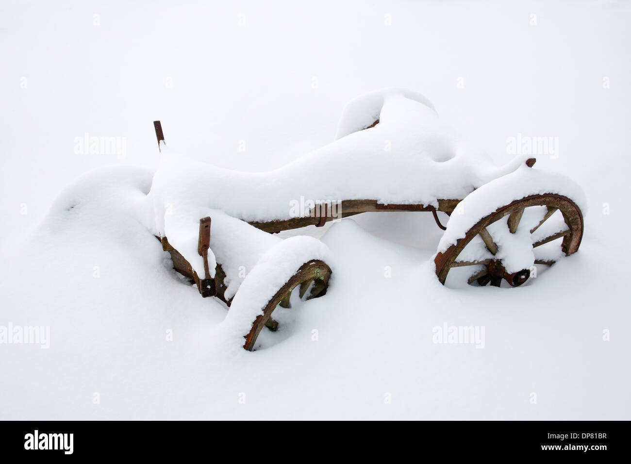 Image of an old wooden Wagon standing in snow, Estonia Europe Stock Photo