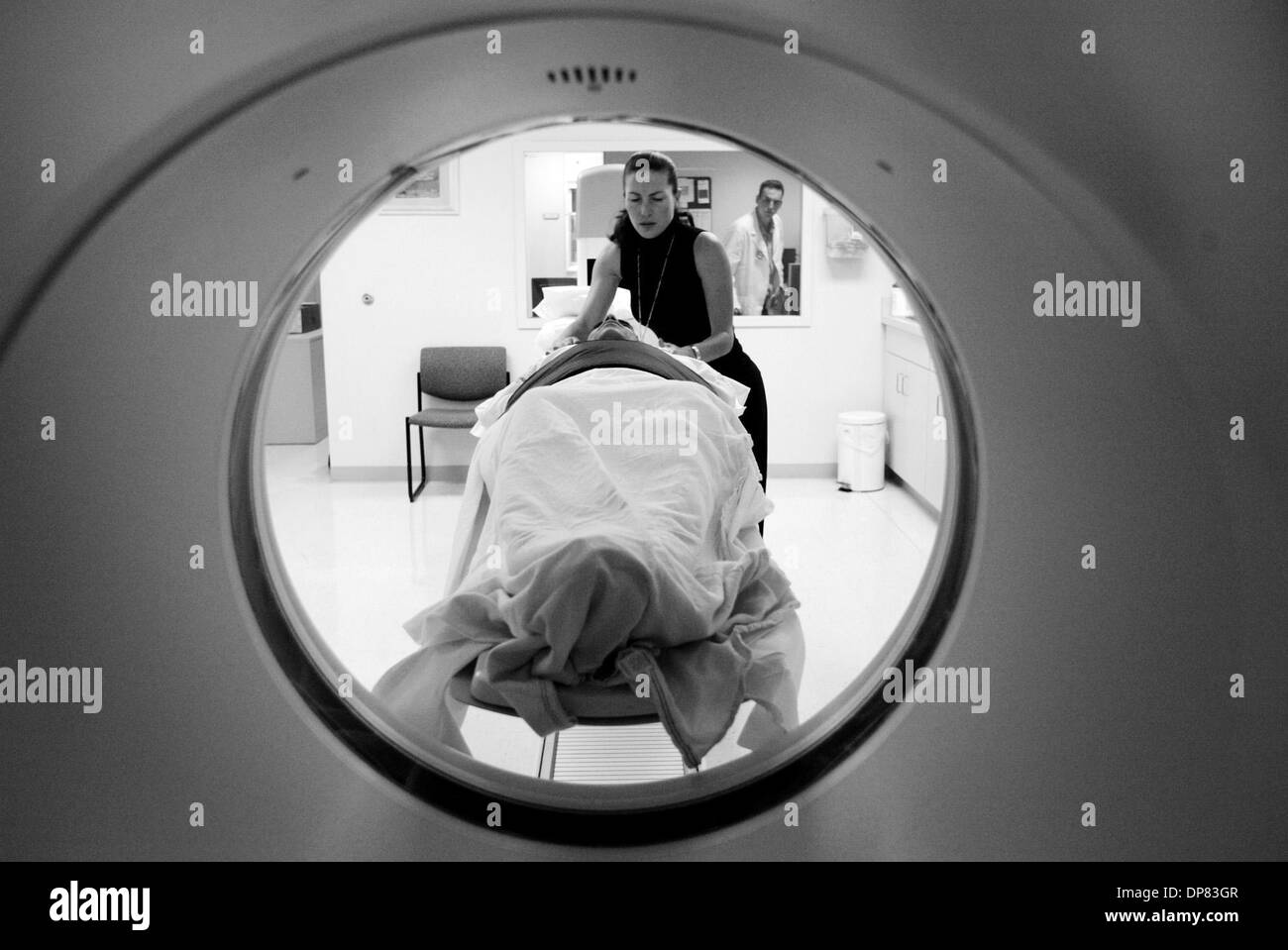 Nov 03, 2006 - San Francisco, CA, USA - Senior Nuclear Medicine Technologist Michelle Huesman prepares John Shevenell for a Positron Emission Tomography (PET) scan at the University of California San Francisco Radiology Department on Oct.11, 2006, in San Francisco, Calif. (Credit Image: © Jane Tyska/The Daily Review/ZUMA Press) RESTRICTIONS: USA Tabloid RIGHTS OUT! Stock Photo
