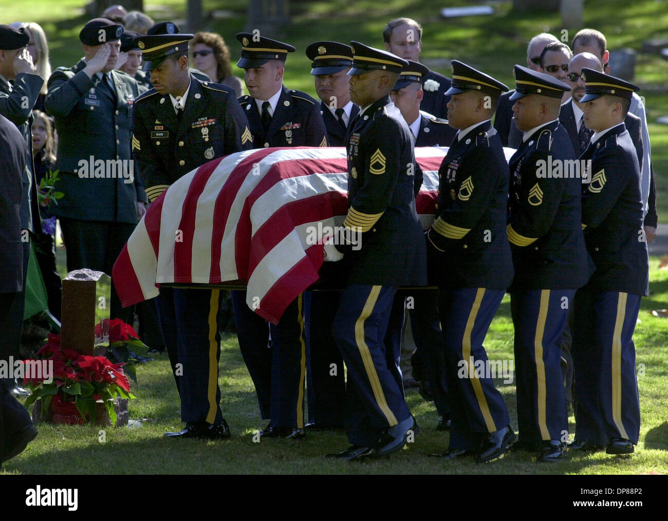 (Published 12/10/2003, NC-2, NI-2) Personnel from the U.S. Army Southern California Recruiting Battalion carry the casket of Stephen Bertolino toward his burial site at Oak Hill Memorial Park in Escondido.  U/T photo CHARLIE NEUMAN Stock Photo