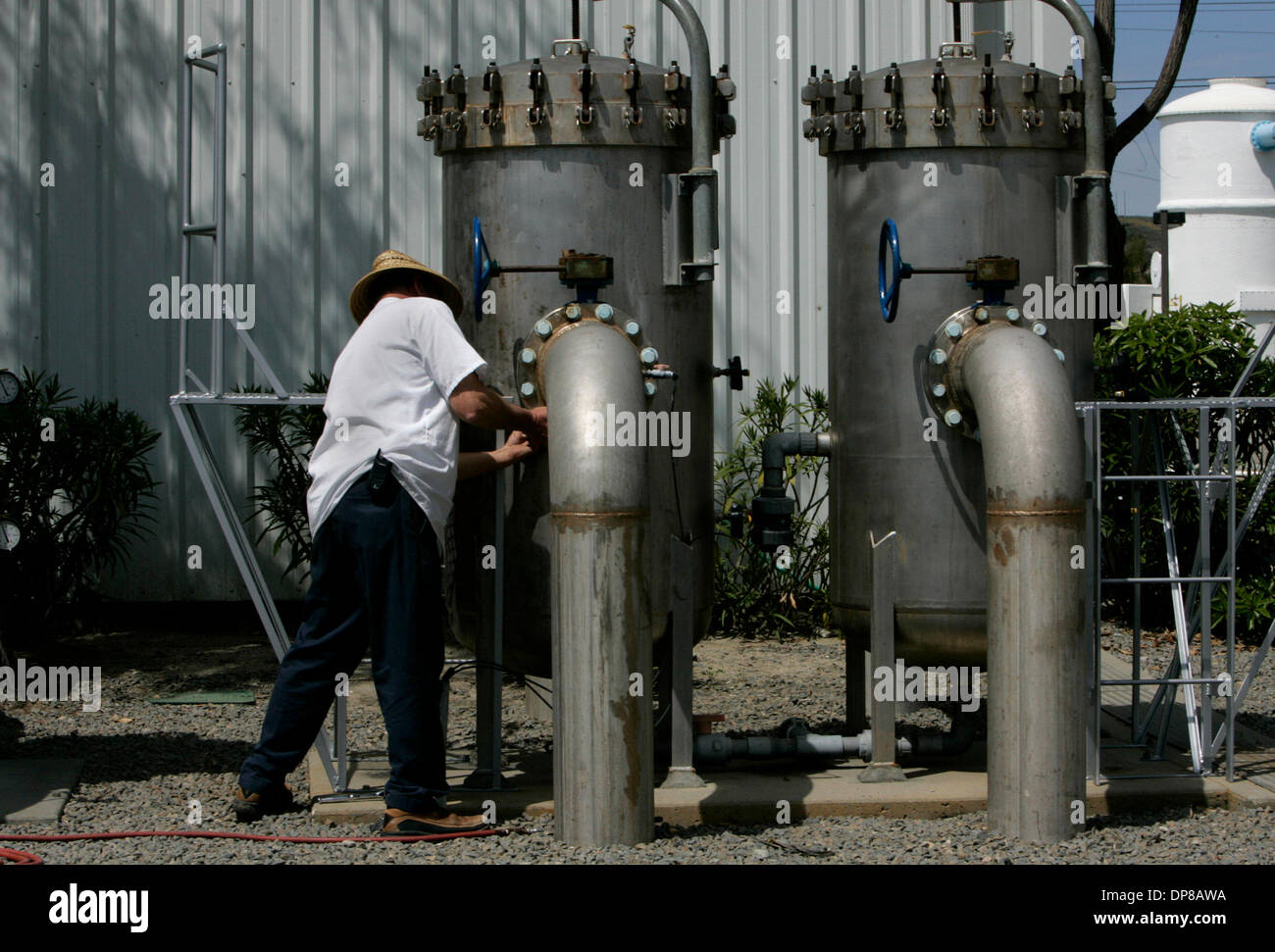(published 4/14/2006, NC-2, NI-2) LE mbgpf255309x003 4-11-2006 Oceanside, CA Oceanside's Mission Basin Groundwater Purification Facility plant operator Richard Browning works near cartridge filter vessels used to pretreat brackish groundwater from the Mission Basin in the lower San Luis Rey River Valley. LAURA EMBRY/San Diego Union-Tribune Stock Photo