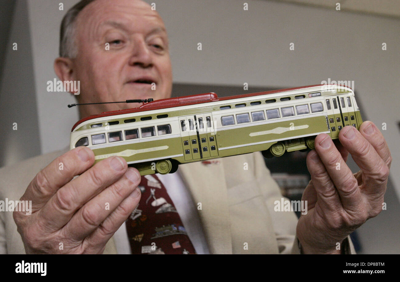 (Published 8/23/2005,  B-1) Harry Mathis, holds a model of an old electric streetcar that he had painted like the ones that used to be used in San Diego. He is spearheading a campaign to bring back two vintage cars to be used in downtown/harborside loop.UT/DON KOHLBAUER Stock Photo