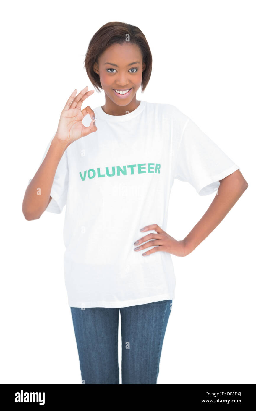 Pretty woman with volunteer tshirt making okay gesture Stock Photo