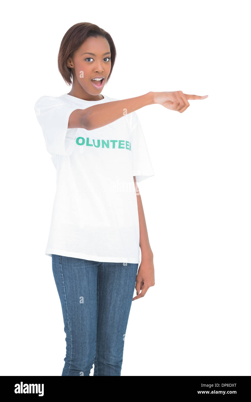 Surprised woman pointing at something Stock Photo