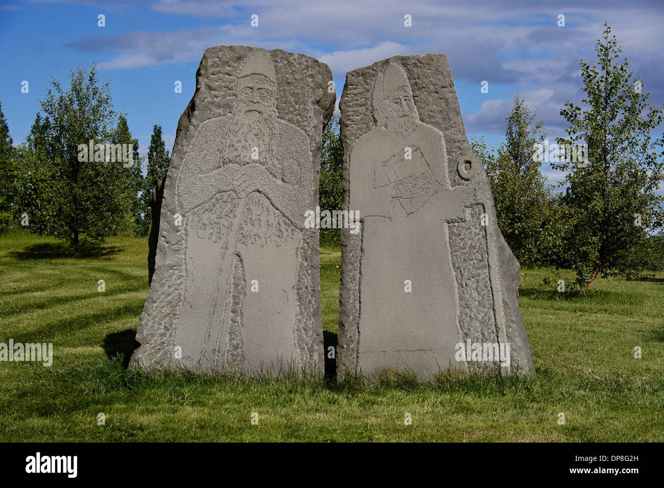 Carved stones representing paganism and Christianity, Skalholt Church, Iceland Stock Photo