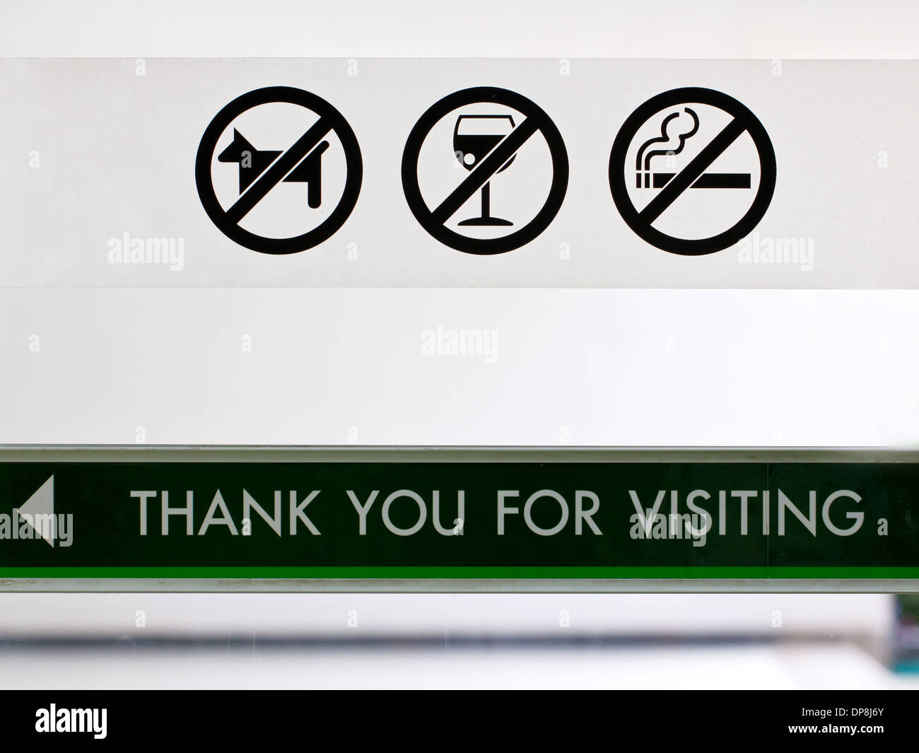 Set of prohibit sign at cafeteria's door include no dogs no alcohol and no smoking. Stock Photo