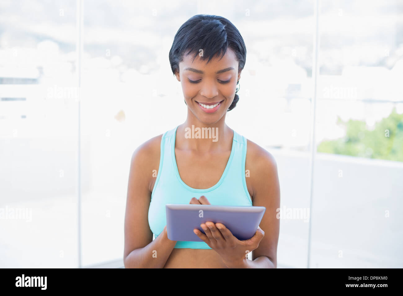Cheerful black woman using hi-res stock photography and images - Alamy