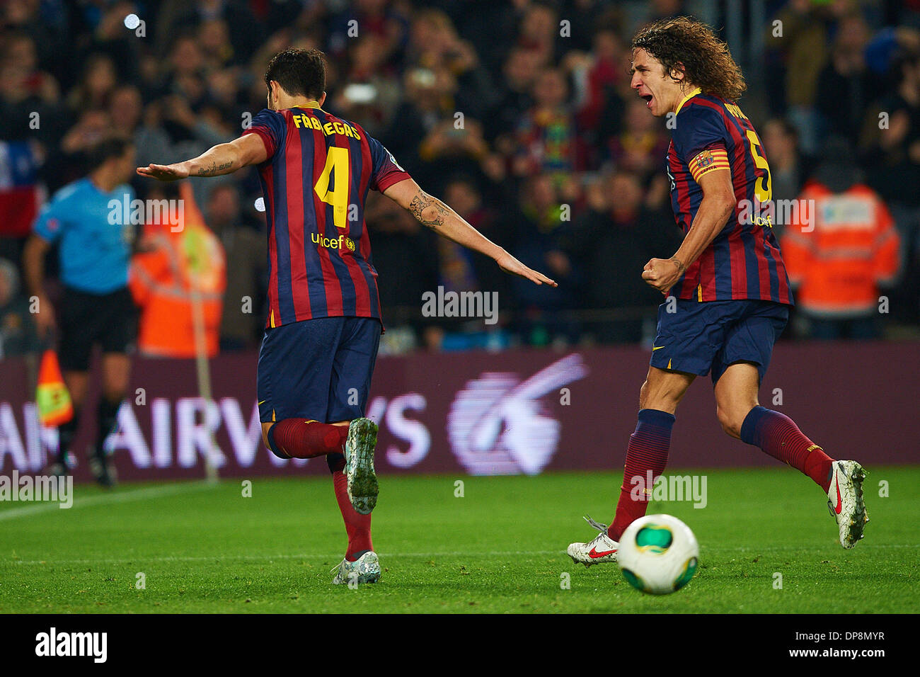 Barcelona, Spain . 08th Jan, 2014. Cesc Fabregas (FC Barcelona) celebrates with his teammate Carles Puyol (FC Barcelona), during Kings Cup soccer match between FC Barcelona and Getafe CF, at the Camp Nou stadium in Barcelona Spain. Wednesday, January 8, 2014. Foto: S.Lau Credit:  dpa picture alliance/Alamy Live News Stock Photo