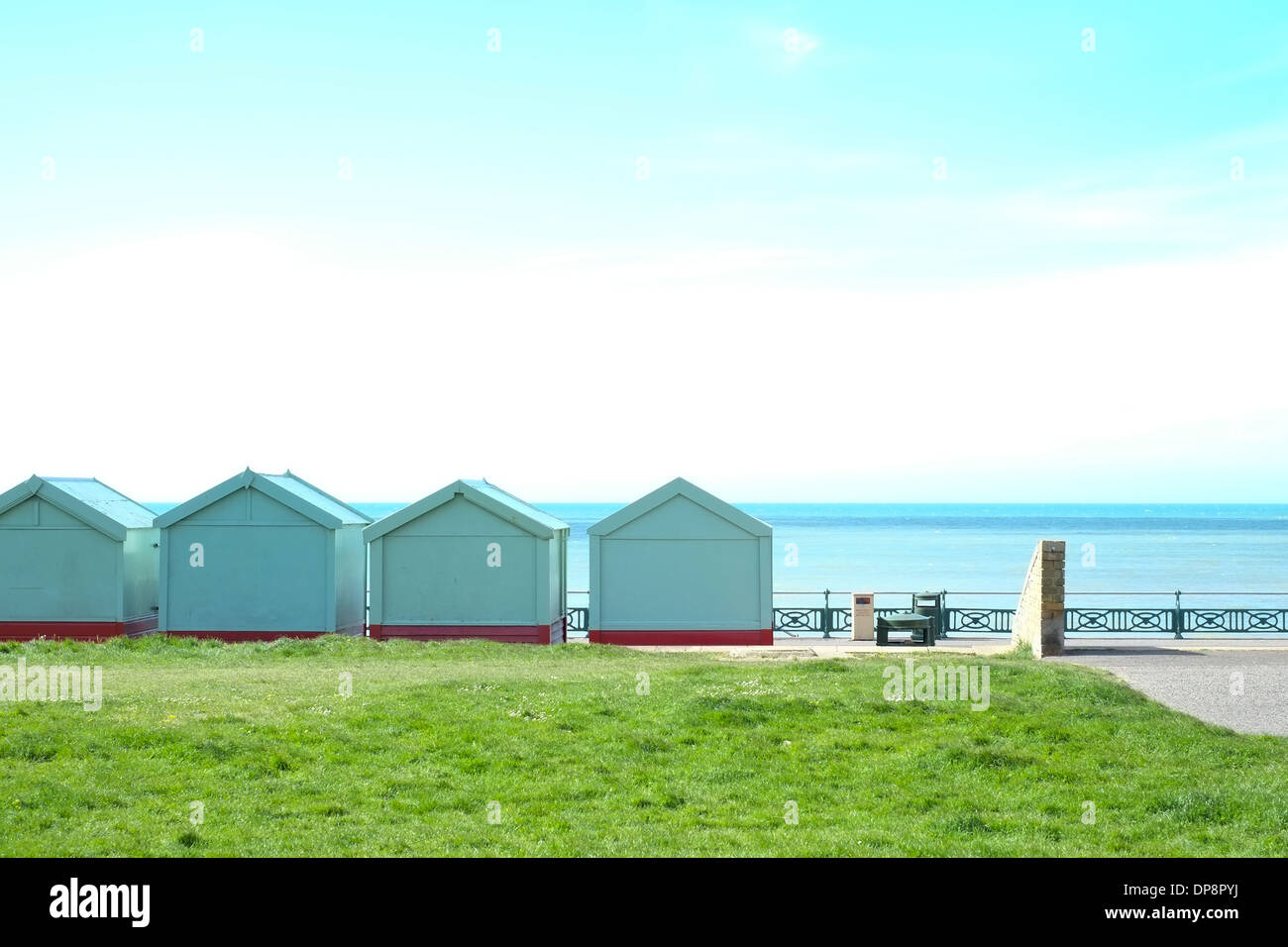 Back of beach huts looking out to sea from Hove, East Sussex Stock Photo