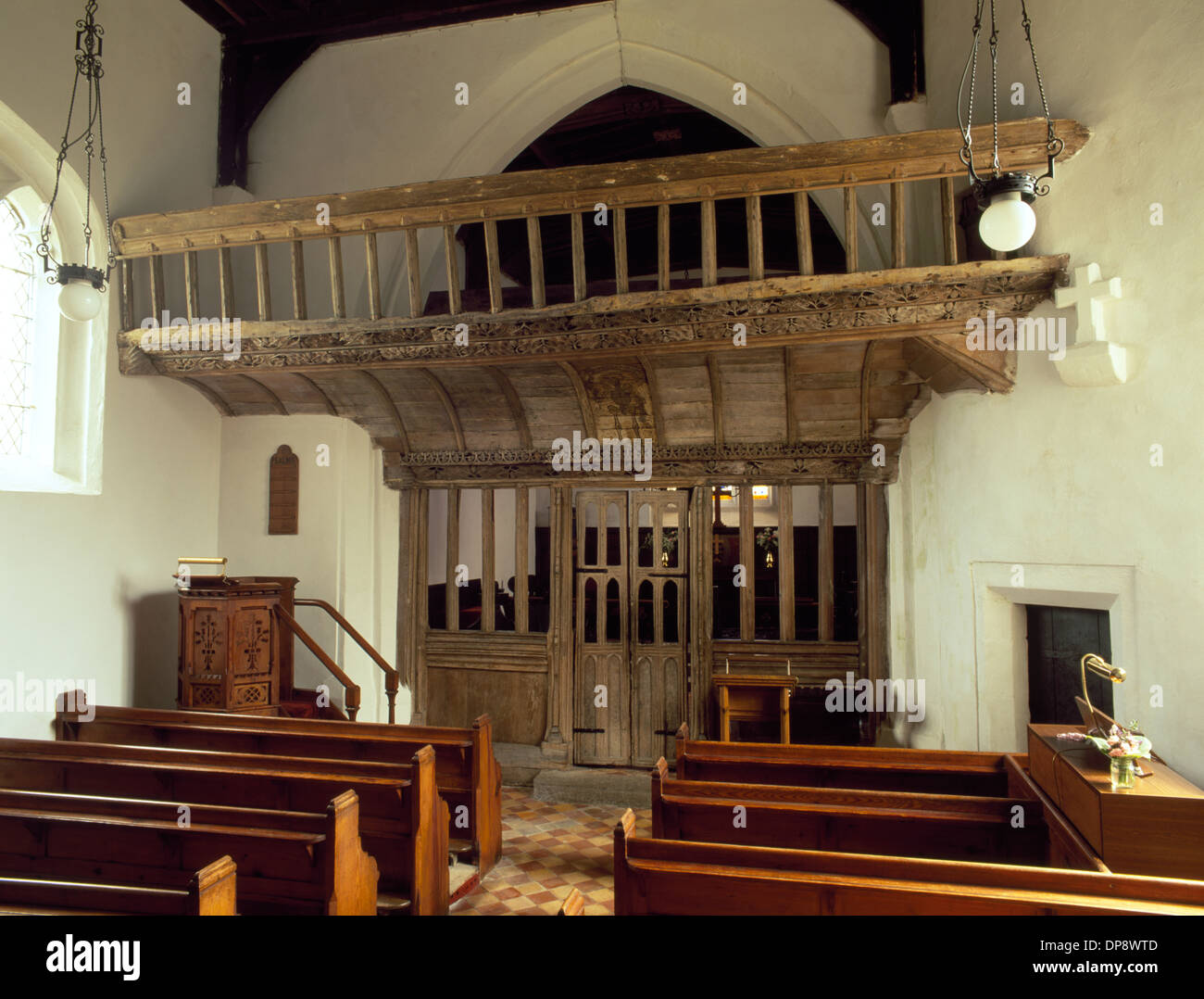Late 15th century (AD1495) carved and painted, oak rood screen and loft inside St Eilian's Church, Llaneilian, Anglesey. Stock Photo