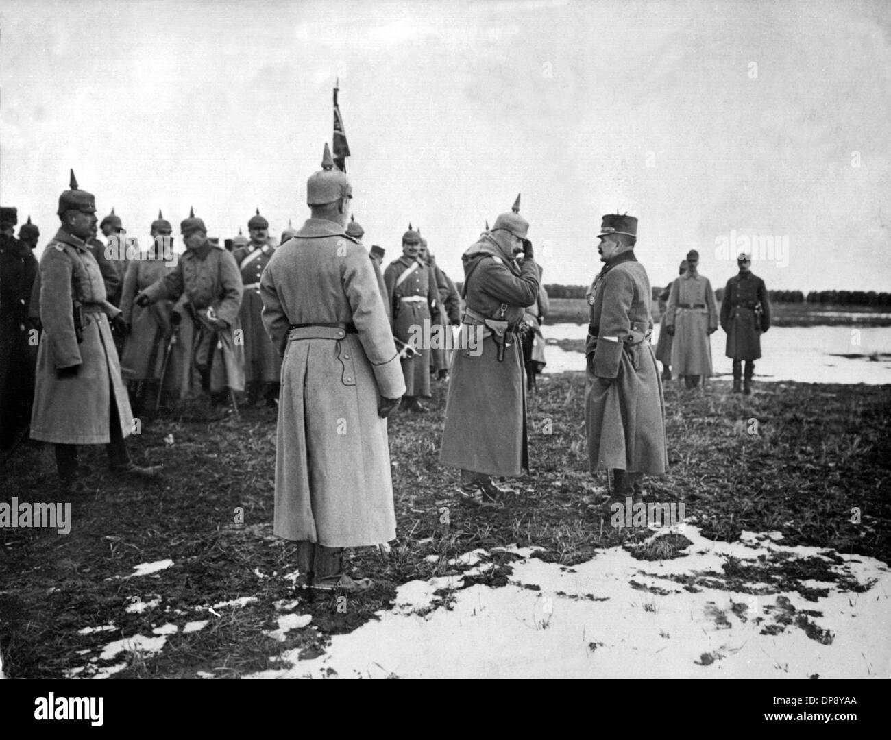 Emperor Wilhelm II (m) visits the German and Austrian-Hungarian troops in Galicia.  The deadly shots by Serbian nationalists on the Austrian heir to the throne Franz Ferdinand on the 28th of June in 1914 in Sarajevo caused the outbreak of the Great War, later to be called World War I, in August 1914. The Central Powers, namely Germany, Austria-Hungary and as well later the Ottoman Empire (Turkey) and Bulgaria against the Triple Entente, consisting of Great Britain, France and Russia, as well as numerous allies. The sad result of World War I, which ended with the defeat of the Central Powers: r Stock Photo