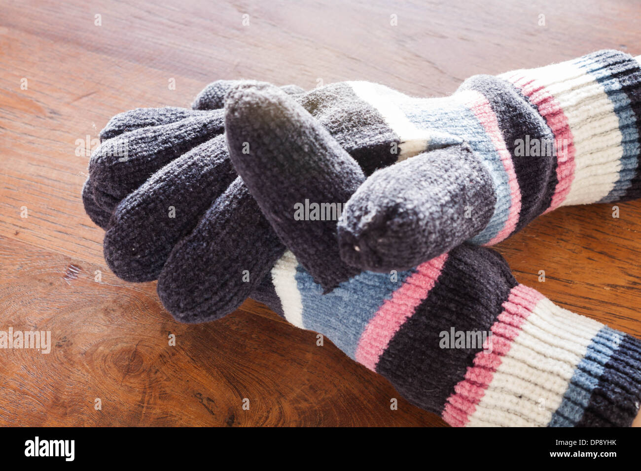 Human hands wear wool gloves, stock photo Stock Photo