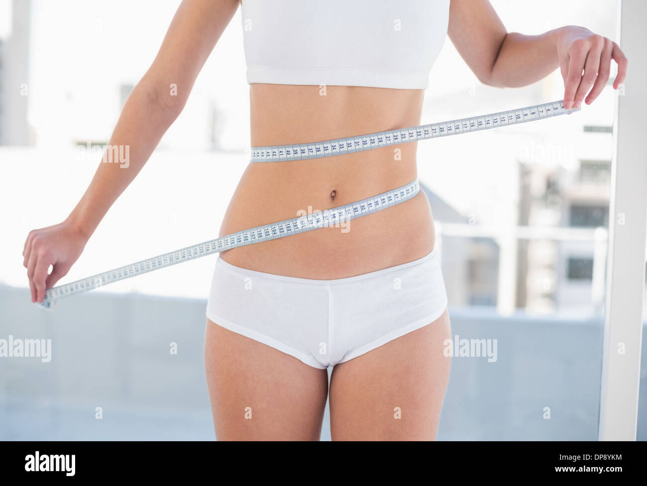 Waist tape measure woman hi-res stock photography and images - Alamy