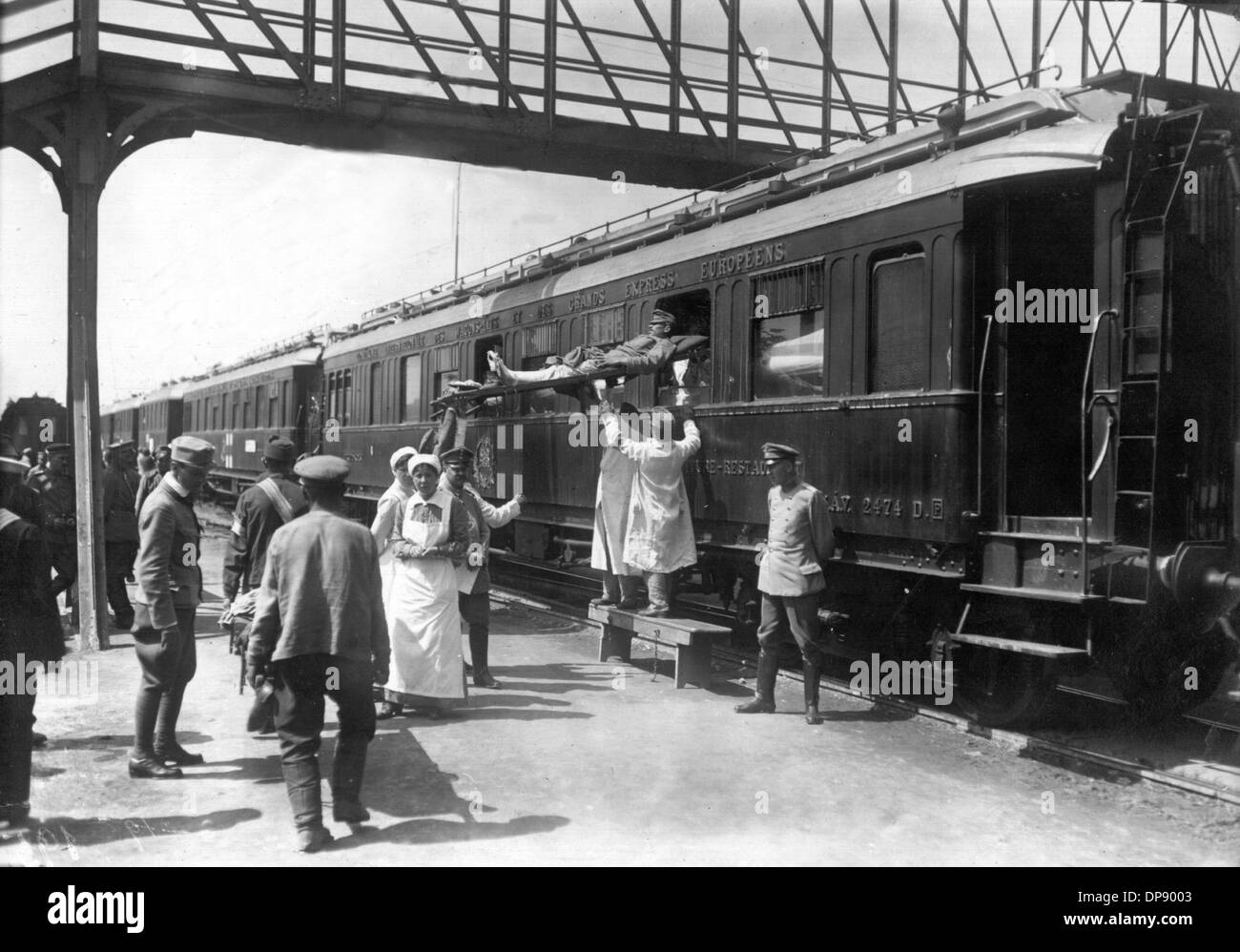 A hospital train with injured people stops at the train station of Galicia during World War I. The deadly shots by Serbian nationalists on the Austrian heir to the throne Franz Ferdinand on the 28th of June in 1914 in Sarajevo caused the outbreak of the Great War, later to be called World War I, in August 1914. The Central Powers, namely Germany, Austria-Hungary and as well later the Ottoman Empire (Turkey) and Bulgaria against the Triple Entente, consisting of Great Britain, France and Russia, as well as numerous allies. The sad result of World War I, which ended with the defeat of the Centra Stock Photo