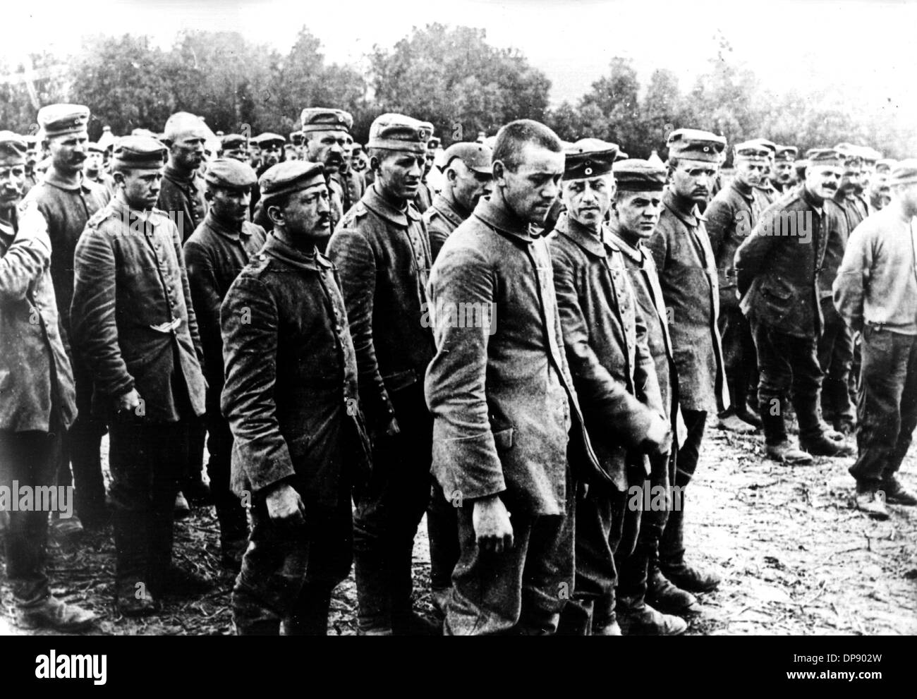 A group of German soldiers, who became British prisoners of war during the major offensive at the Western front in April 1918. Set off by the deadly shots on Austrian heir to the throne Franz Ferdinand by Serbian nationalists on the 28th of June in 1914 in Sarajevo, World War I broke out. During World War I, Germany, Austria, Austria-Hungary as well as later Turkey and Bulgary fought against Britain, France and Russia. The sad end result in 1918 comprised roughly 8.5 million soldiers killed in action, more than 21 million wounded and almost 8 million prisoners of war and missing people. Stock Photo