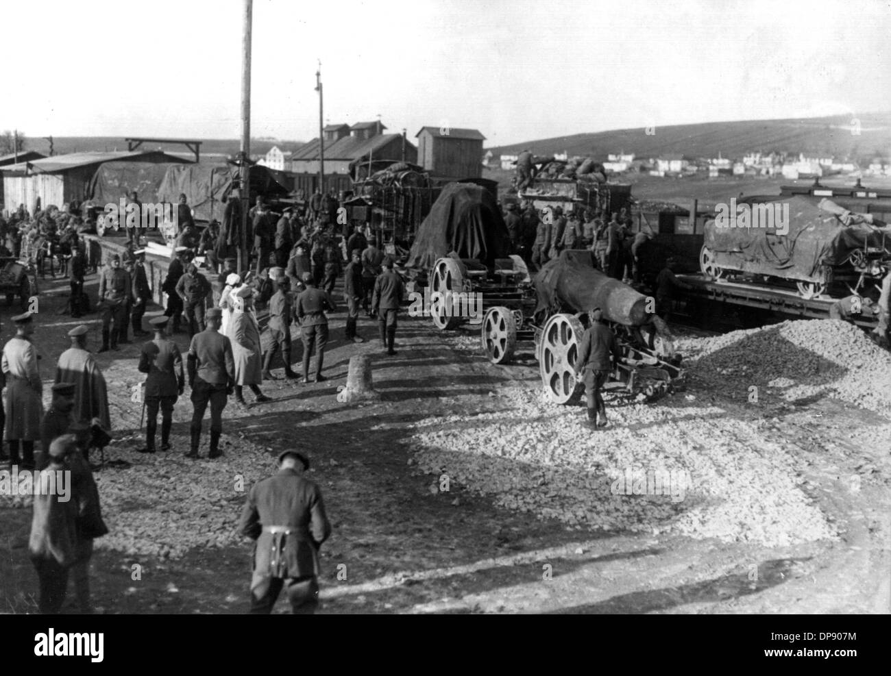 Heavy artillery is unloaded by soldiers of the Austrian-Hungarian army behind the front line. The deadly shots by Serbian nationalists on the Austrian heir to the throne Franz Ferdinand on the 28th of June in 1914 in Sarajevo caused the outbreak of the Great War, later to be called World War I, in August 1914. The Central Powers, namely Germany, Austria-Hungary and as well later the Ottoman Empire (Turkey) and Bulgaria against the Triple Entente, consisting of Great Britain, France and Russia, as well as numerous allies. The sad result of World War I, which ended with the defeat of the Centr Stock Photo